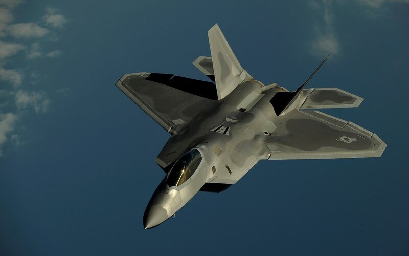 F-22 Raptor Fighter Jet — Blue, Dramatic, Photograph, Sky