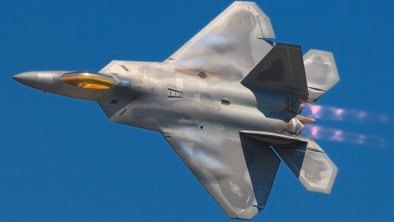 F-22 Raptor Fighter Jet — Blue, Dynamic, Afternoon, Photograph, Jet Engine Exhaust, Blue Sky