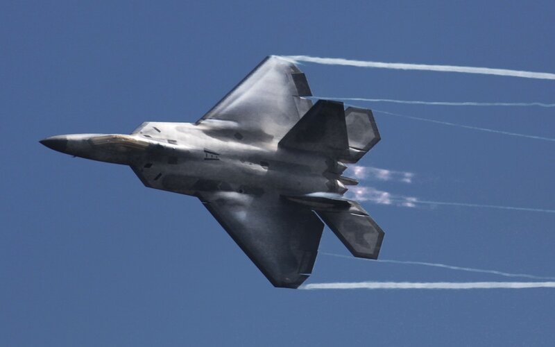 F-22 Raptor Fighter Jet — Blue, Dynamic, Afternoon, Photograph, Smoke Trails, Sky