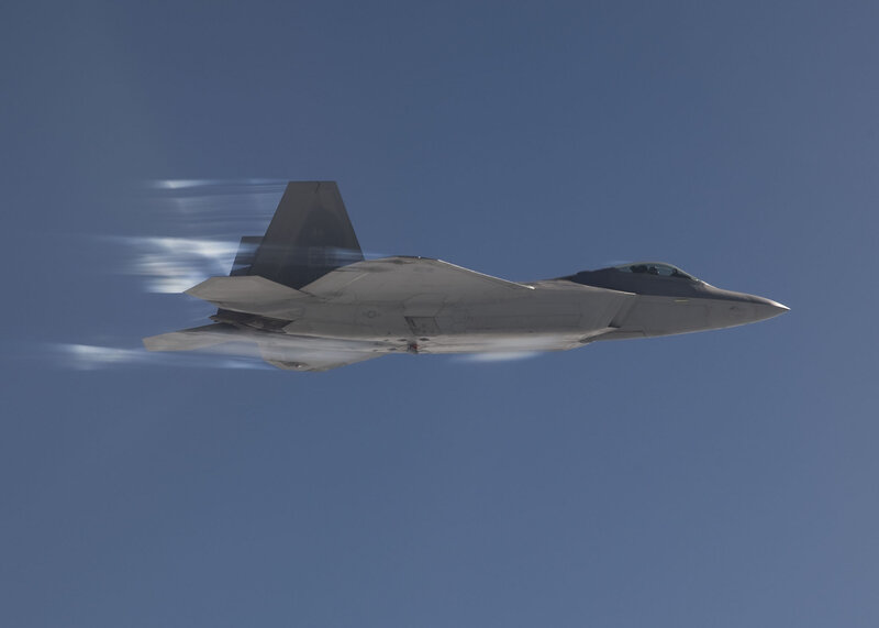 F-22 Raptor Fighter Jet — Blue, Dynamic, Photograph, Sky