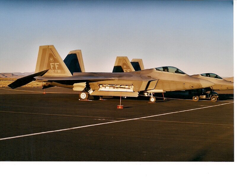 F-22 Raptor Fighter Jet — Gray, Calm, Afternoon