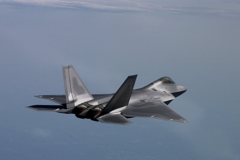 F-22 Raptor Fighter Jet — Gray, Calm, Photograph