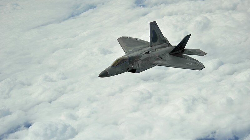 F-22 Raptor Fighter Jet — Gray, Clouds