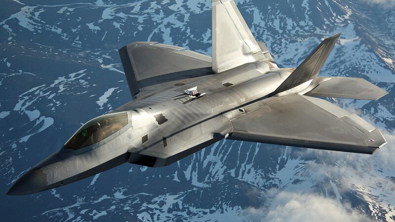F-22 Raptor Fighter Jet — Gray, Dramatic, Photograph, Mountains