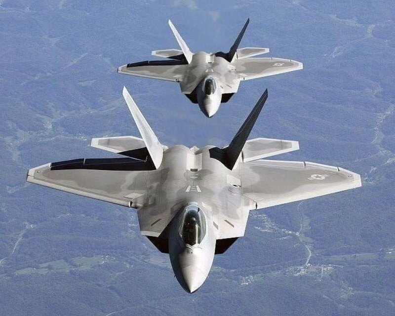F-22 Raptor fighter jets in formation