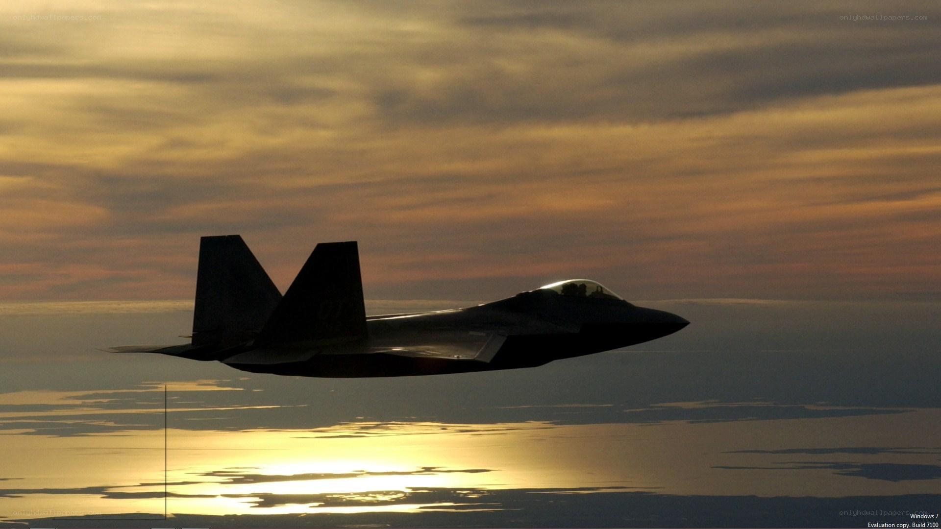 F-22 Raptor in sunset silhouette