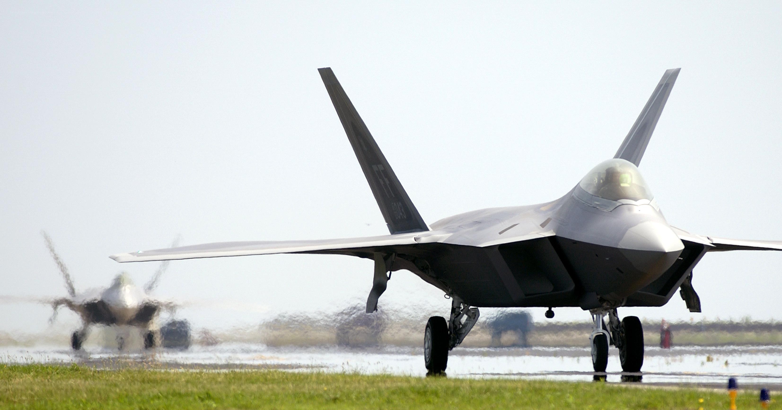F-22 Raptor on a wet runway