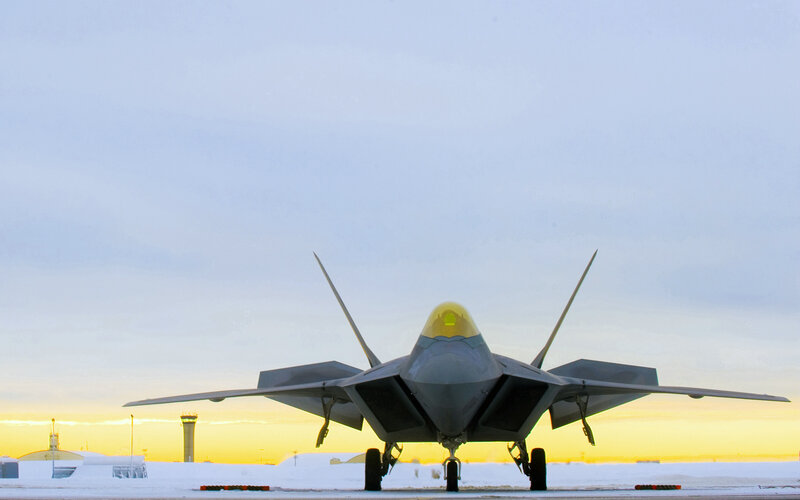 F-22 Raptor on snowy tarmac
