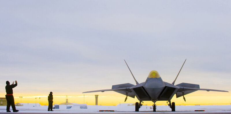 F-22 Raptor on snowy tarmac