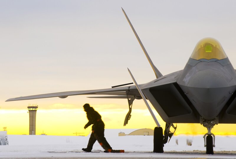F-22 Raptor on snowy tarmac
