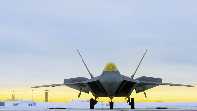 F-22 Raptor on snowy tarmac
