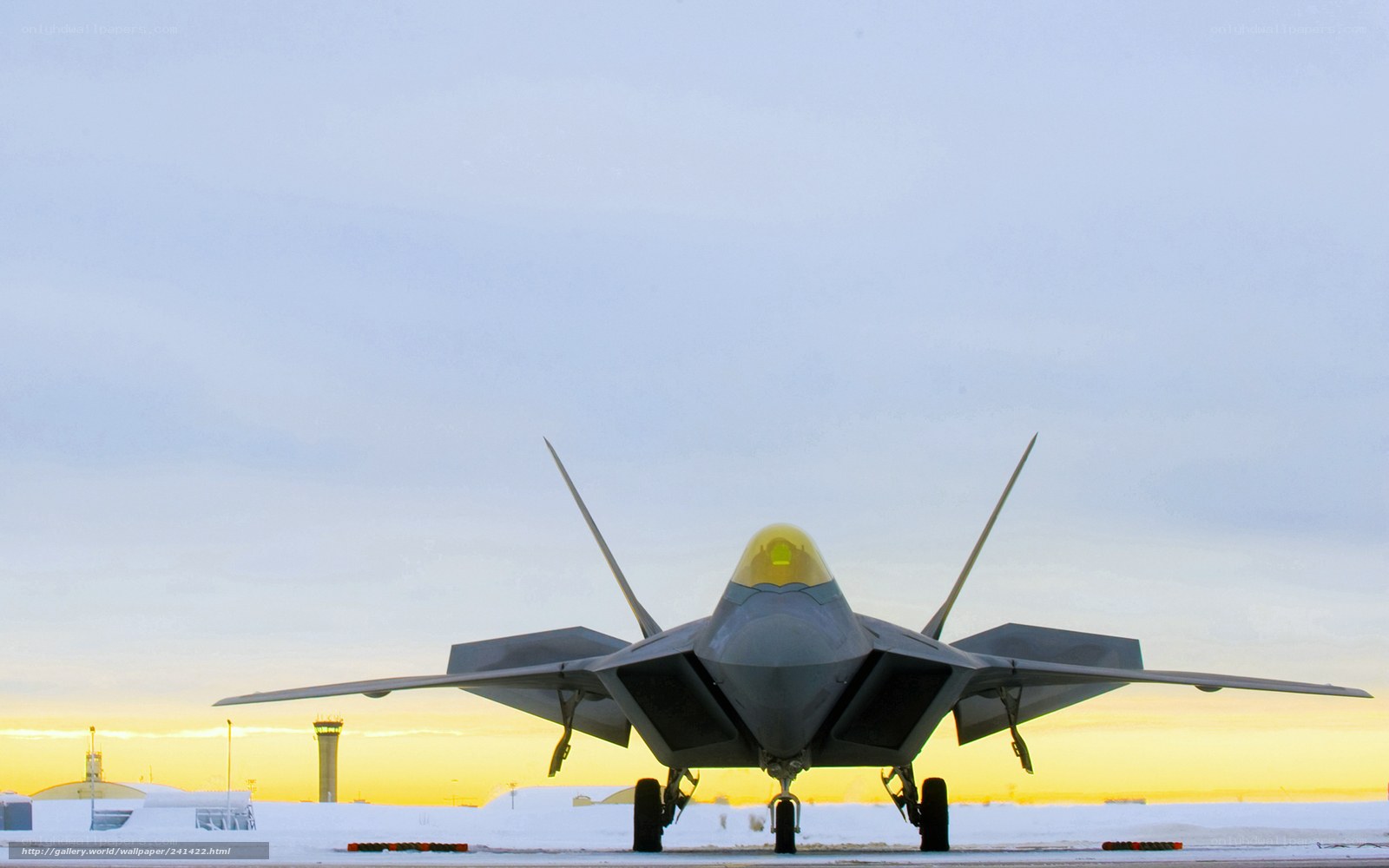 F-22 Raptor on snowy tarmac