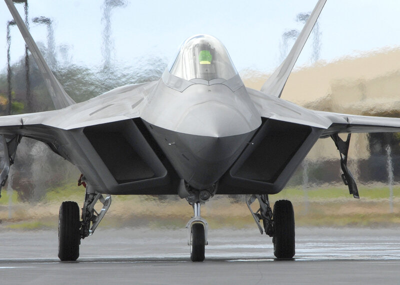 F-22 Raptor on wet tarmac