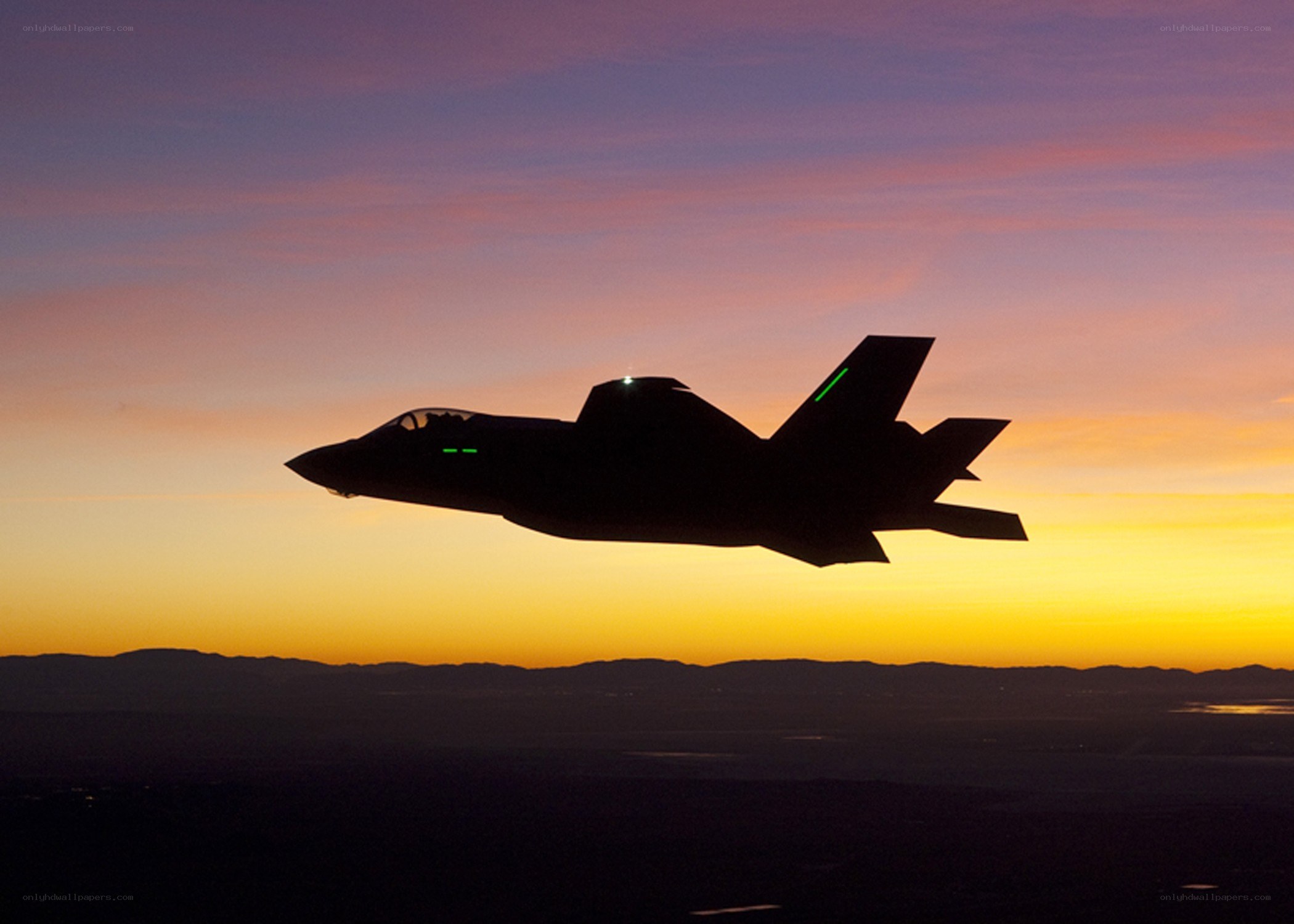 F-35 fighter jet at sunset