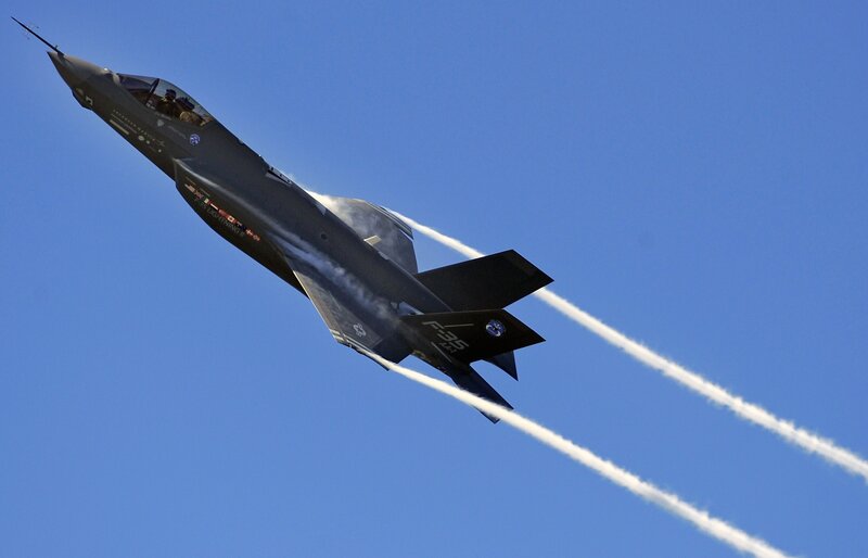 F-35 Fighter Jet — Blue, Dynamic, Afternoon, Photograph, Smoke Trails