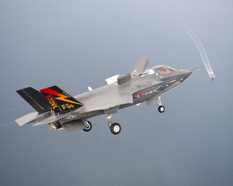 F-35 Fighter Jet — Gray, Calm, Afternoon, Photograph, Ocean
