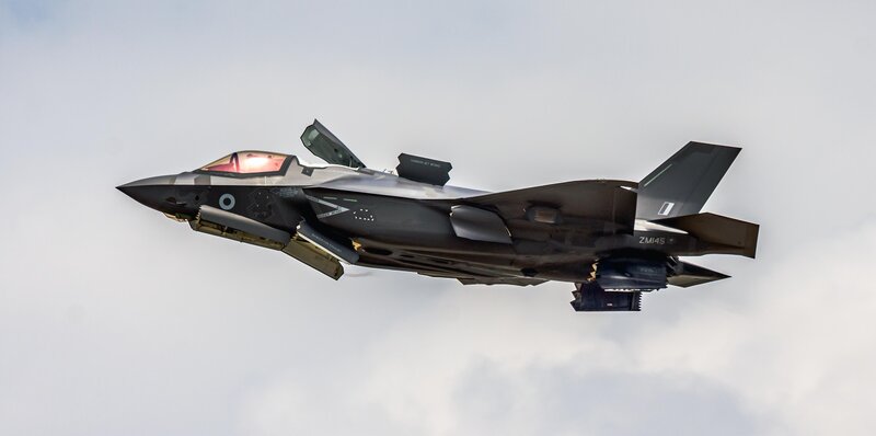 F-35 Fighter Jet — Gray, Dramatic, Afternoon, Photograph, Aircraft, Sky, Clouds