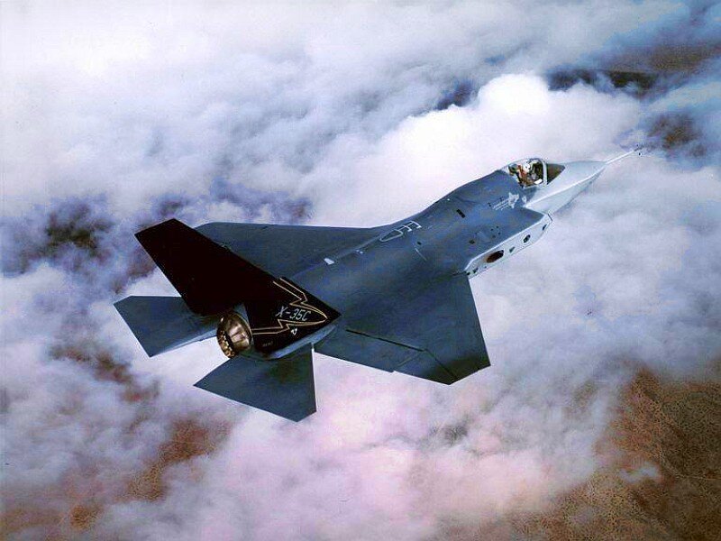 F-35 Fighter Jet — Gray, Dramatic, Photograph, Clouds, Pilot, White