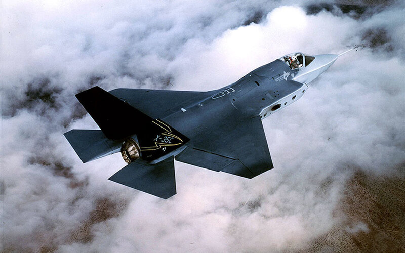 F-35 Fighter Jet — Gray, Dramatic, Photograph, Clouds