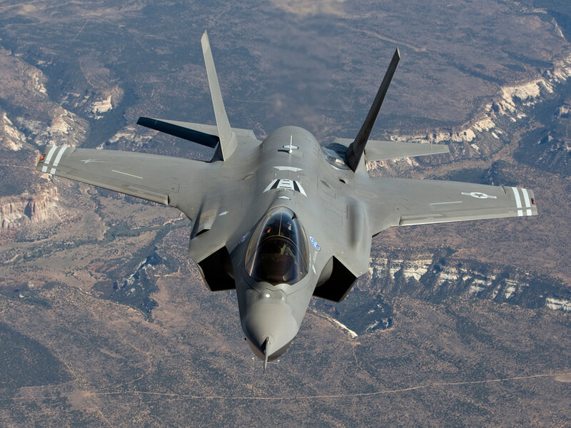 F-35 Fighter Jet — Gray, Dramatic, Photograph, Mountainous Terrain