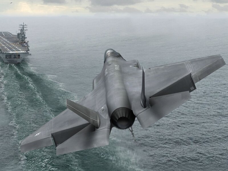 F-35 jet near aircraft carrier