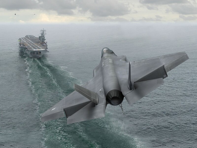 F-35 jet near aircraft carrier