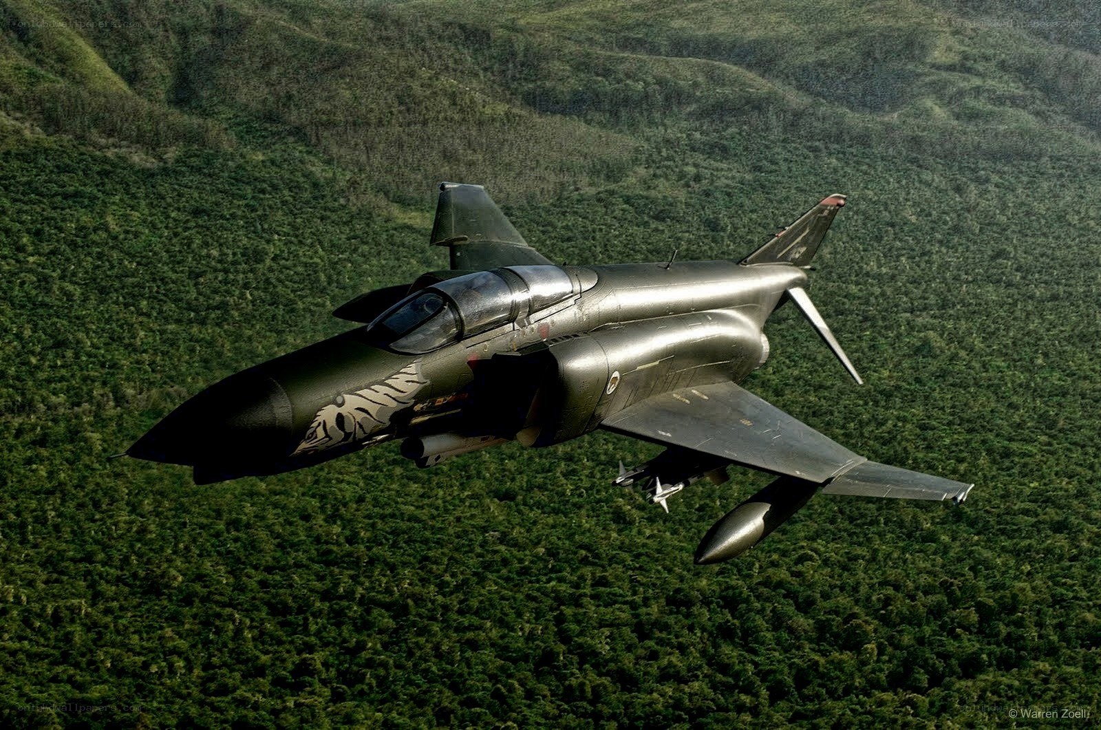 F-4 Phantom II over jungle