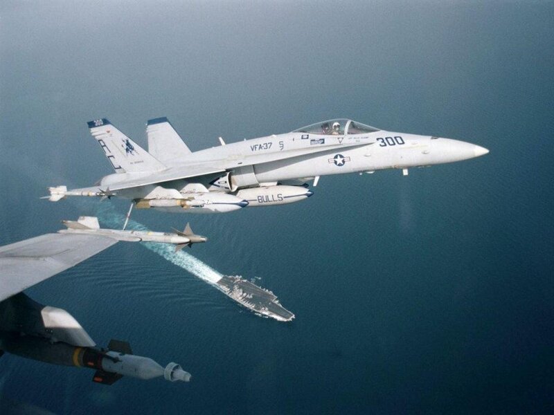 F/A-18 Hornet over aircraft carrier