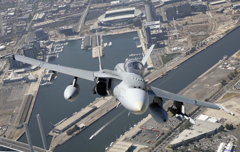 F/A-18 Hornet over city