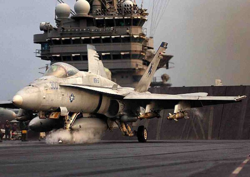 F/A-18 jet on aircraft carrier