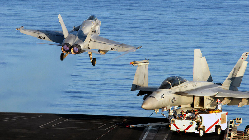F/A-18 jets on aircraft carrier