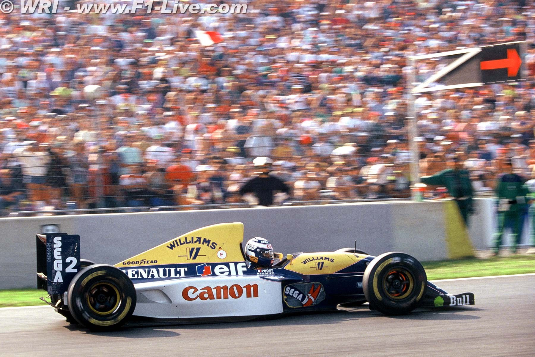 F1 car racing at speed