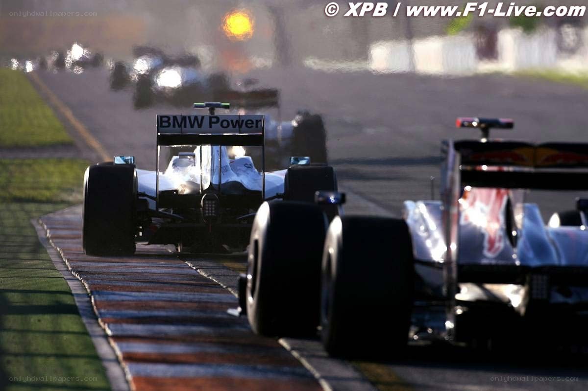 F1 cars on a racetrack