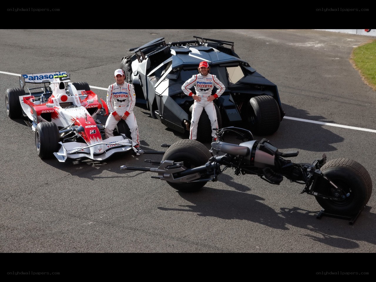 F1 driver with Batmobile and Tumbler