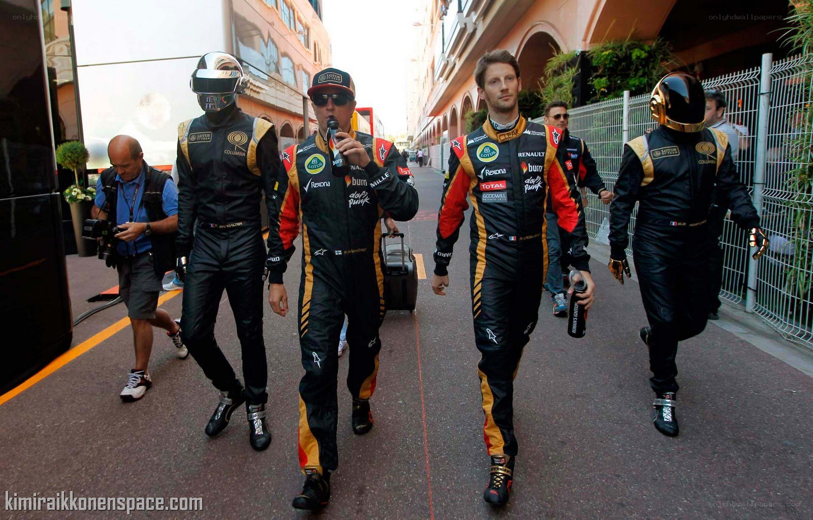 F1 drivers walking in pit lane