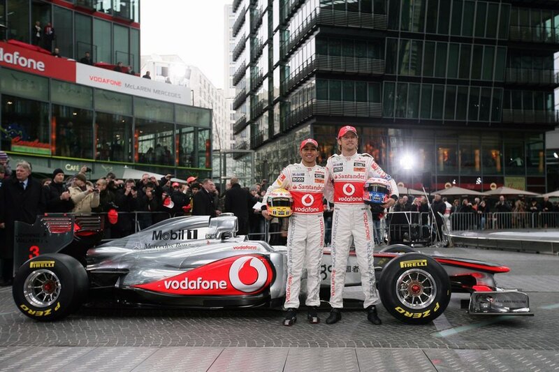F1 drivers with car