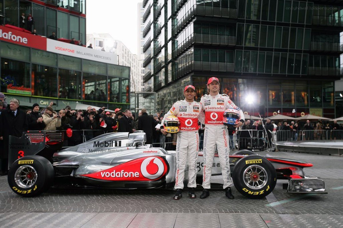 F1 drivers with car