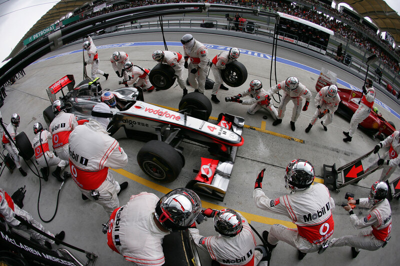 F1 Pit Crew Changing Tires