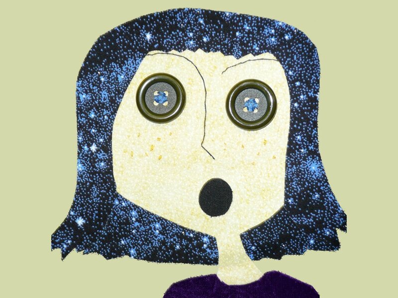 fabric art of a surprised face