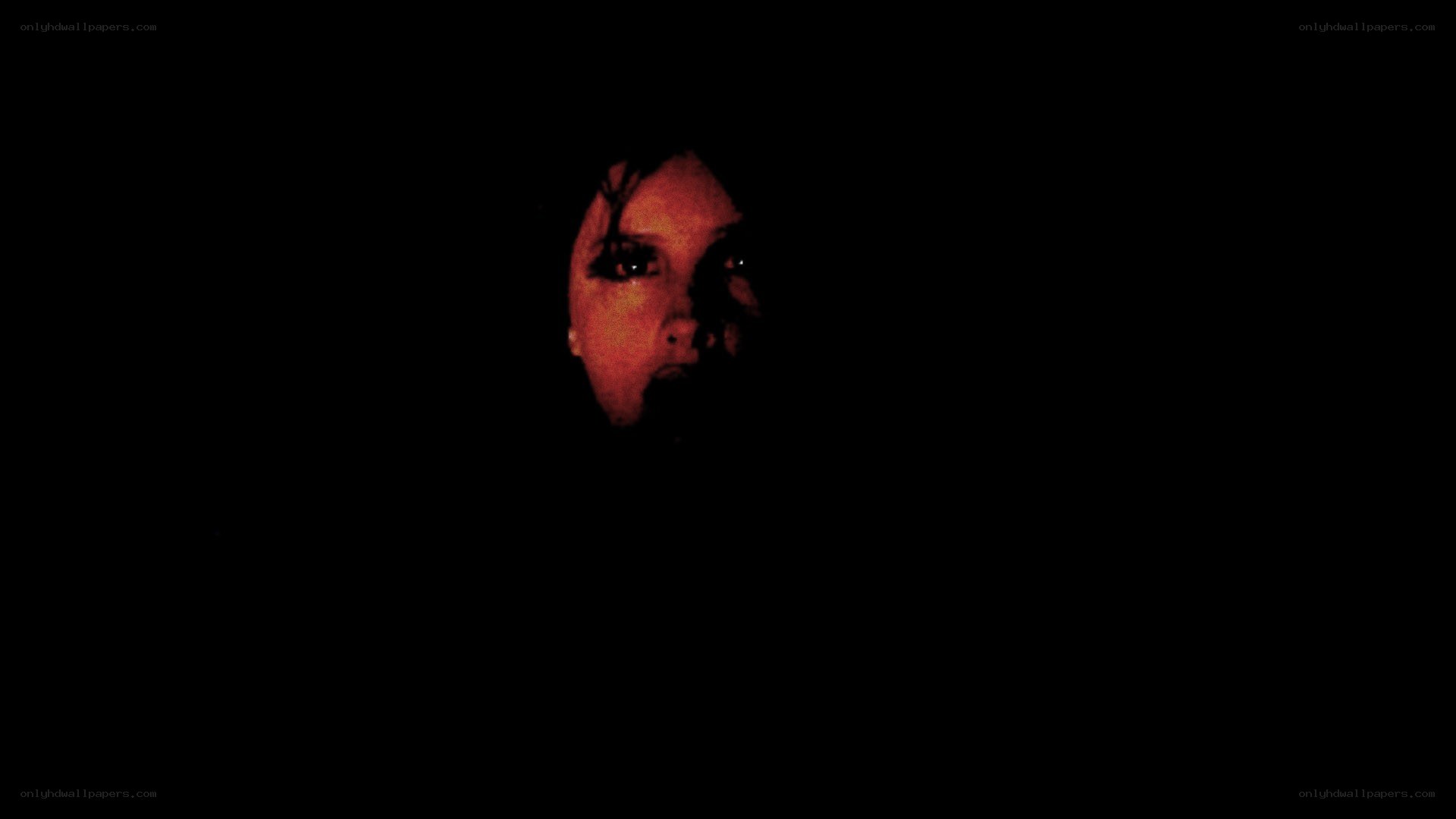 face in dark red light