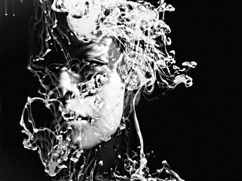 Face in White Smoke