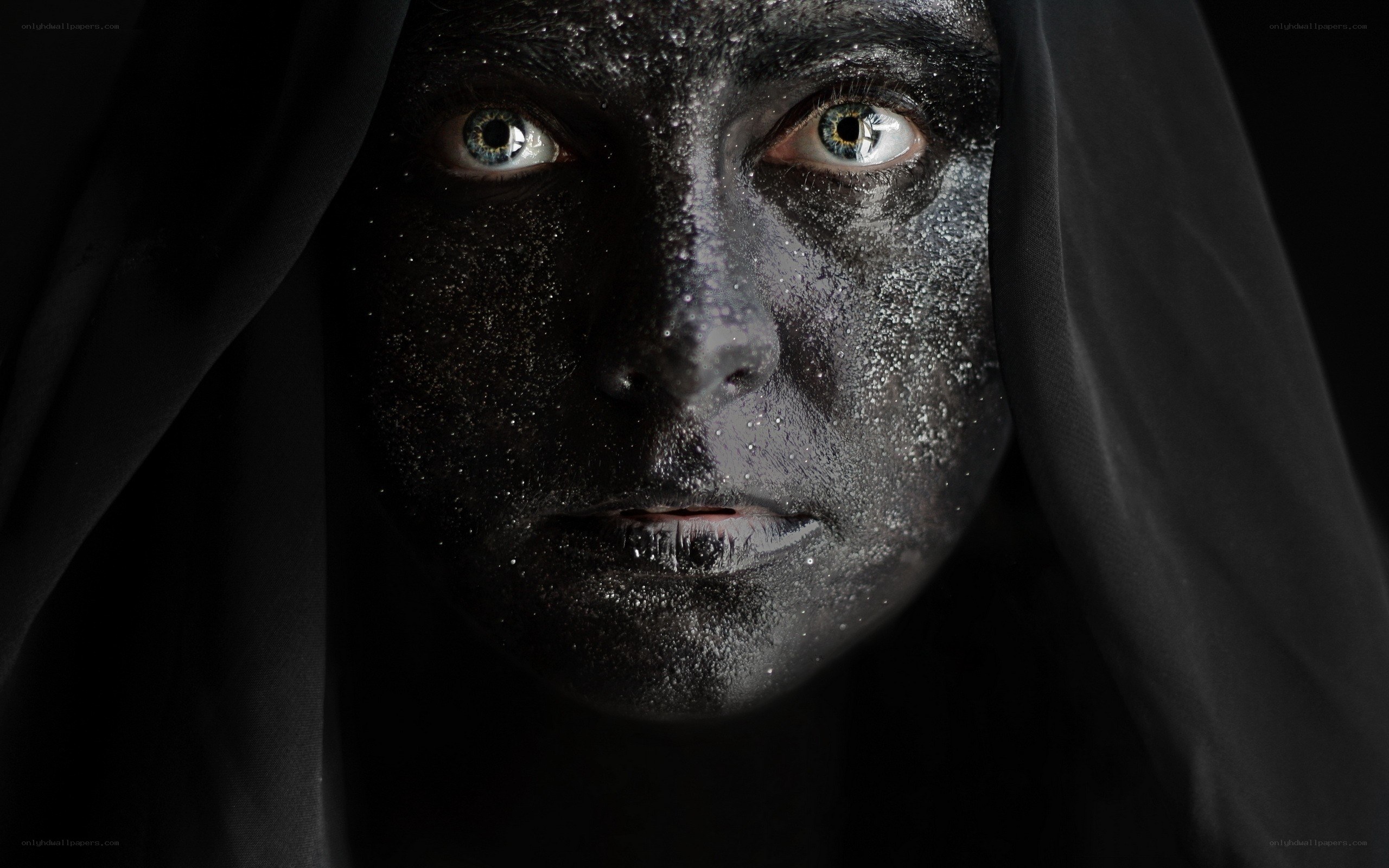 face with black glitter makeup