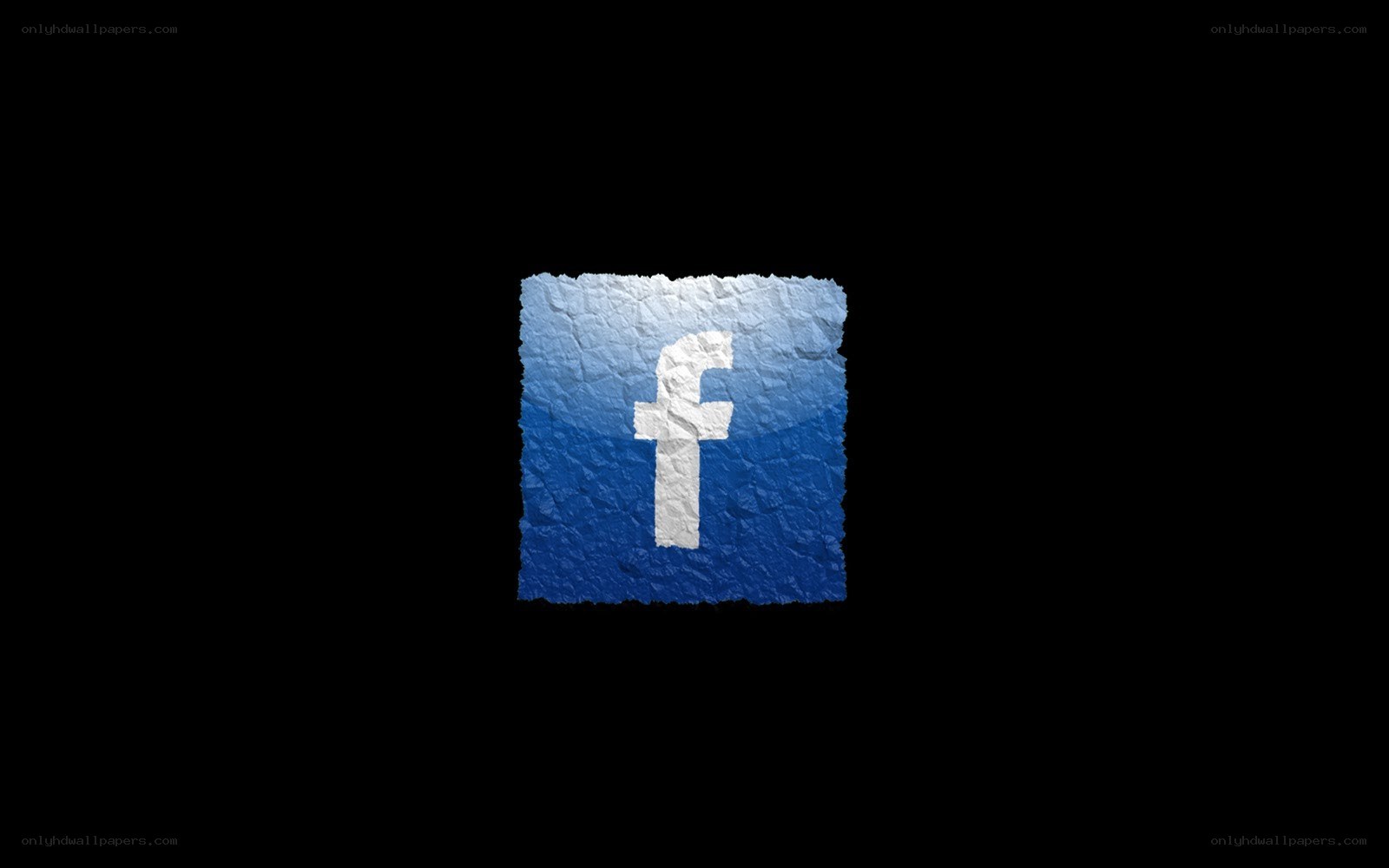 Facebook logo on crumpled paper