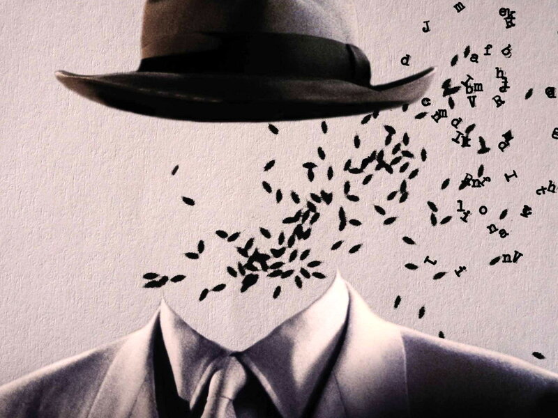 faceless man in hat