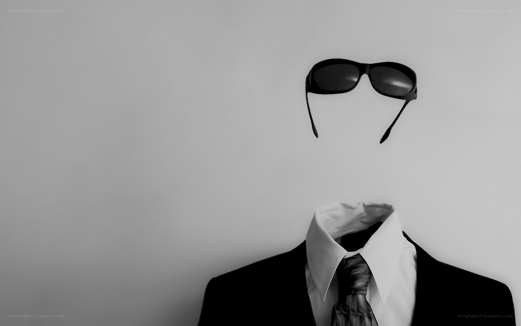 faceless man in suit