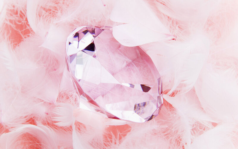 Faceted Crystal on Feathers