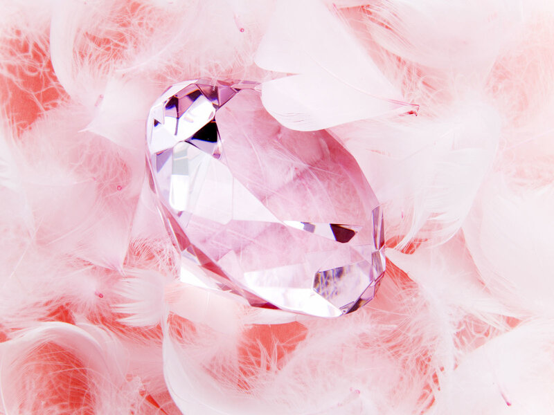 Faceted Gem on Feathers