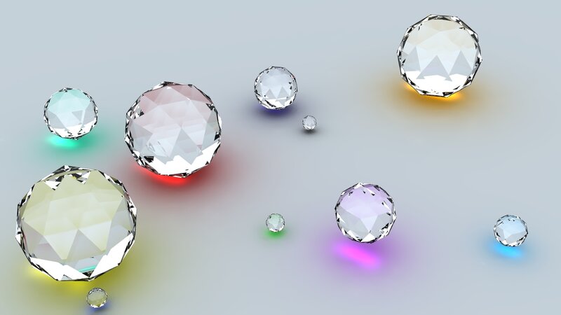 Faceted gemstones on a gradient background