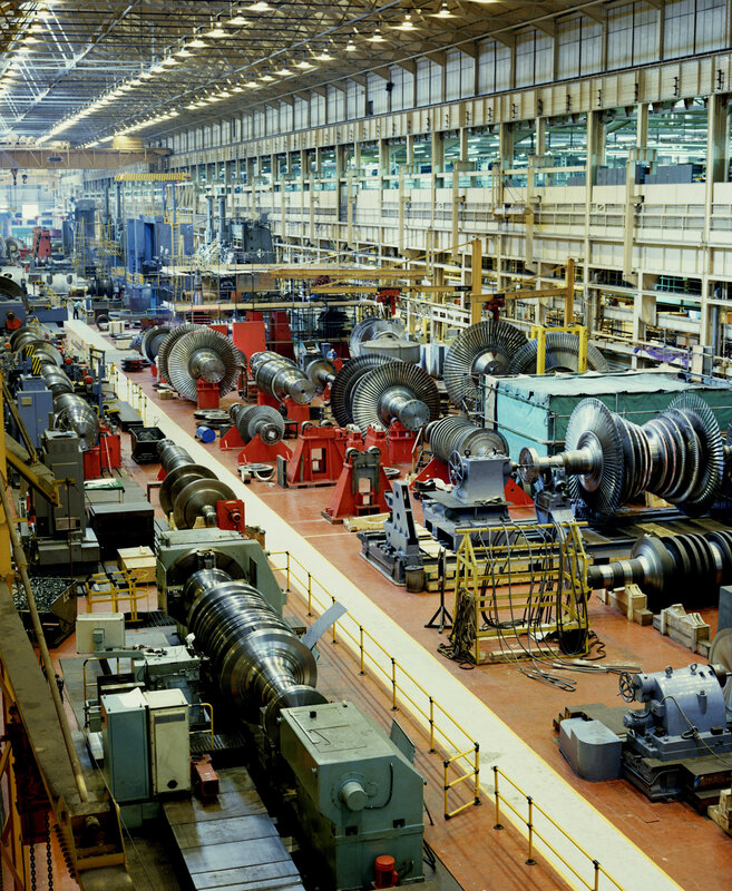 Factory assembly line with turbines