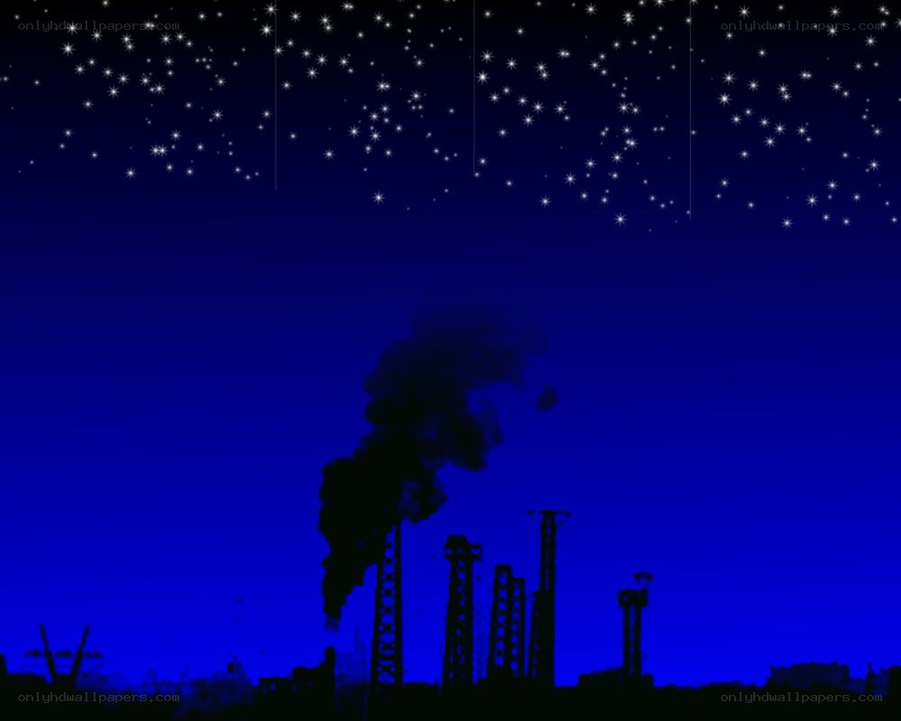 Factory at night under stars